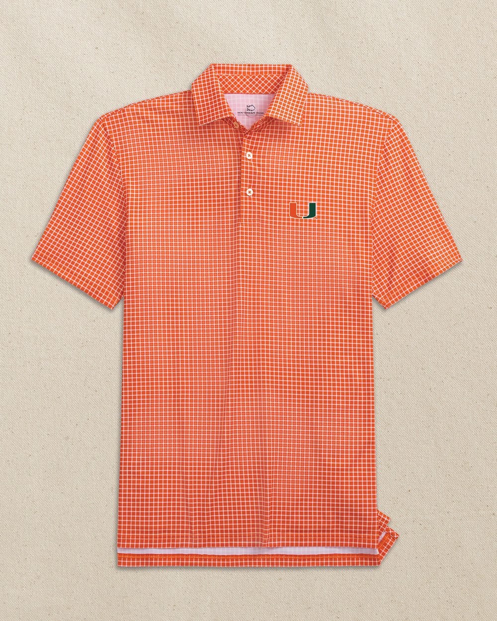 The front view of the Southern Tide Miami Hurricanes Driver Dunes Edge Plaid Polo by Southern Tide - Endzone Orange