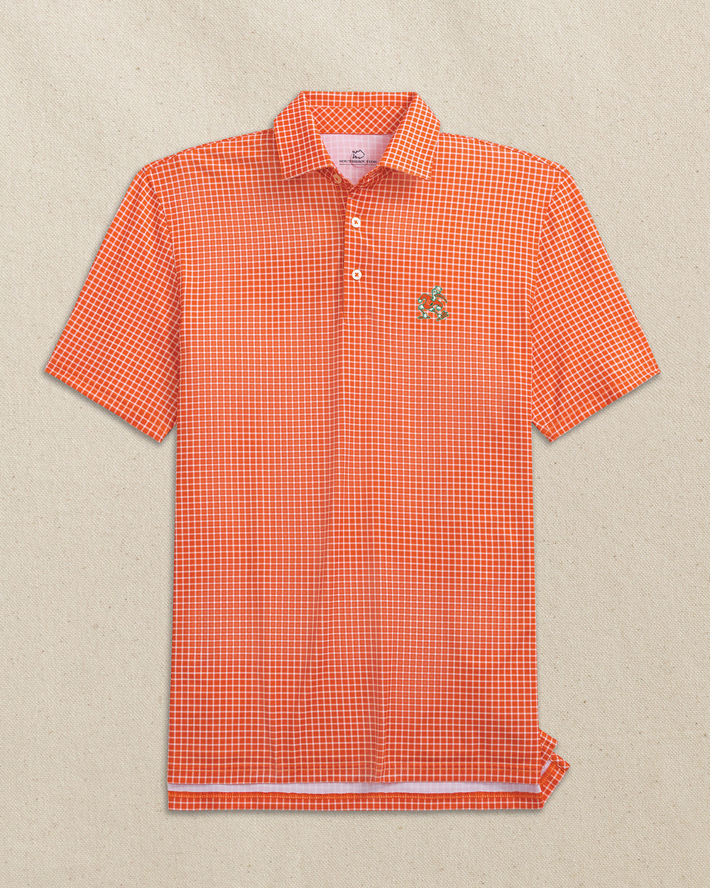 The front view of the Southern Tide Miami Sebastian the Ibis Driver Dunes Edge Plaid Polo by Southern Tide - Endzone Orange