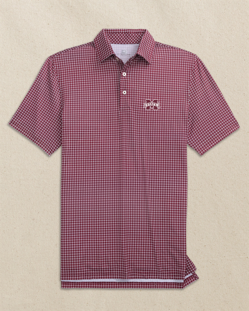 The front view of the Southern Tide Mississippi State Bulldogs Driver Dunes Edge Plaid Polo by Southern Tide - Chianti