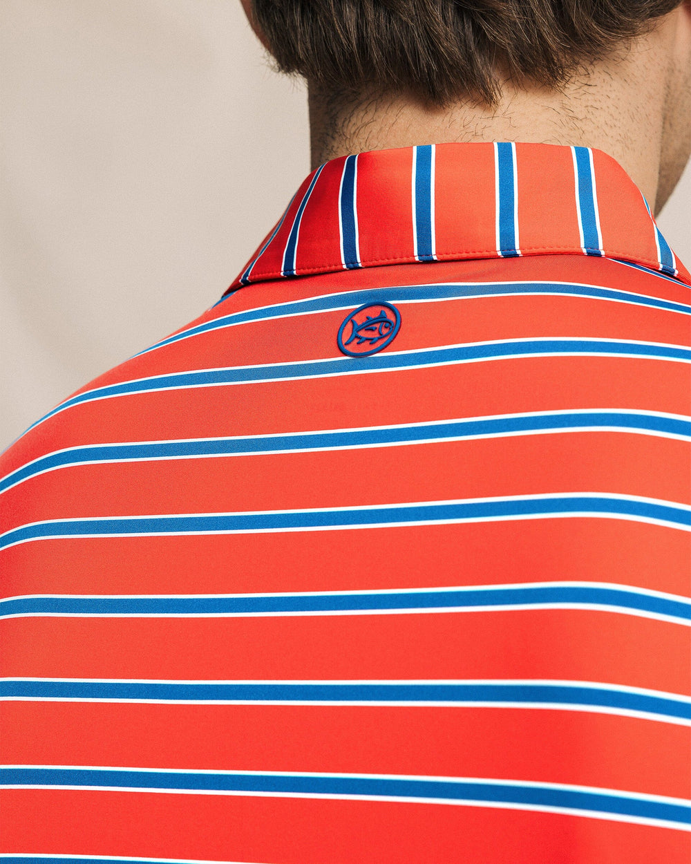 The detail view of the Southern Tide Moonlight Bay Stripe Coastal Breeze® Performance Polo by Southern Tide - Channel Marker Red