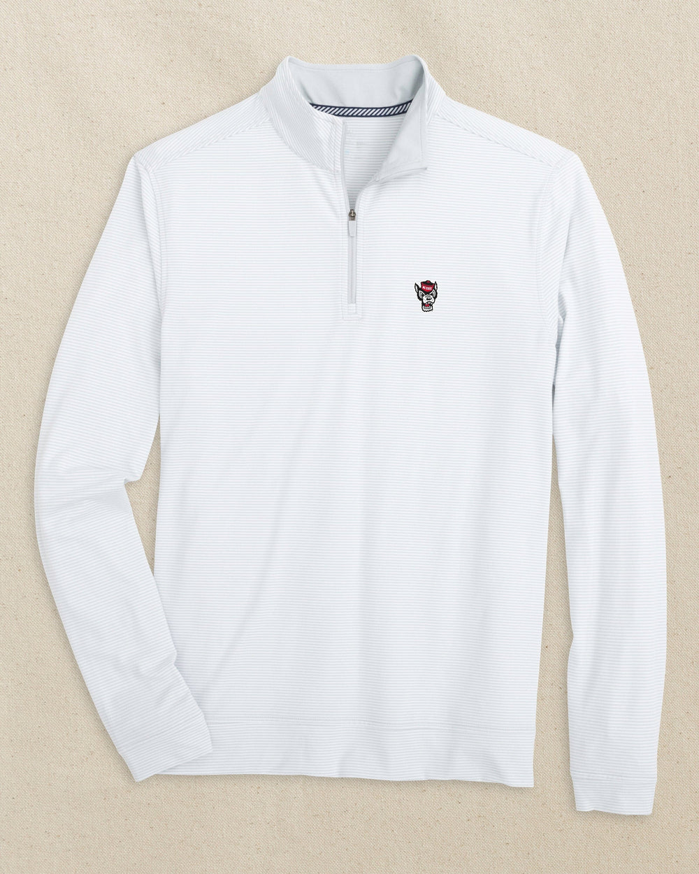 The front view of the Southern Tide NC State Wolf Head Cruiser Micro-Stripe Heather Quarter Zip by Southern Tide - Heather Slate Grey