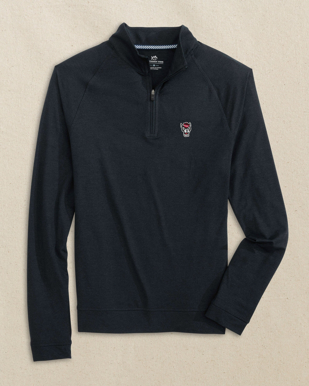 The front view of the Southern Tide NC State Wolf Head Cruiser Quarter Zip by Southern Tide - Heather Caviar Black