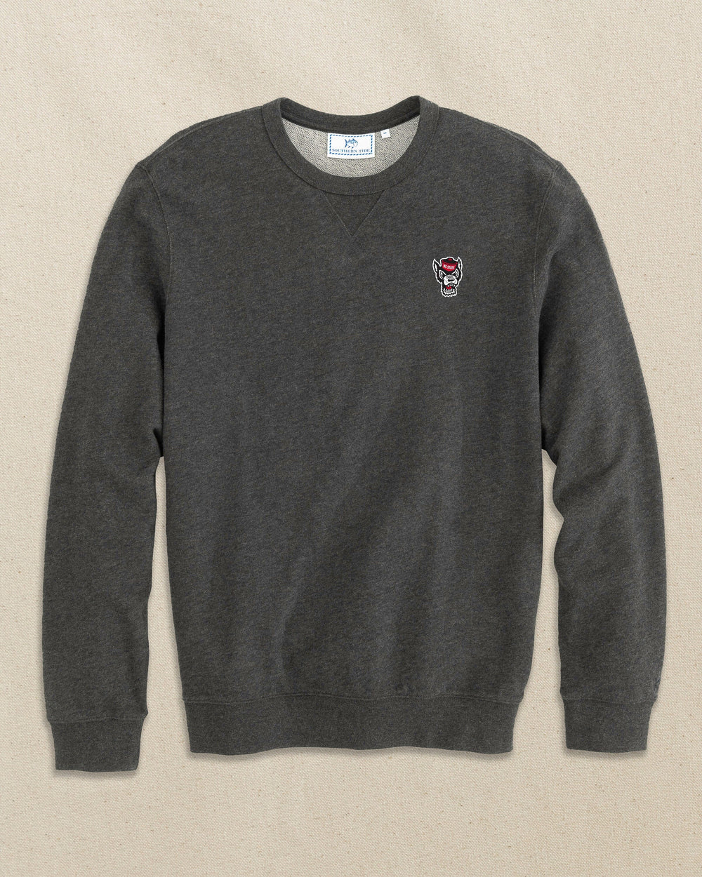The front view of the Southern Tide NC State Wolf Head Upper Deck Pullover Sweatshirt by Southern Tide - Heather Black