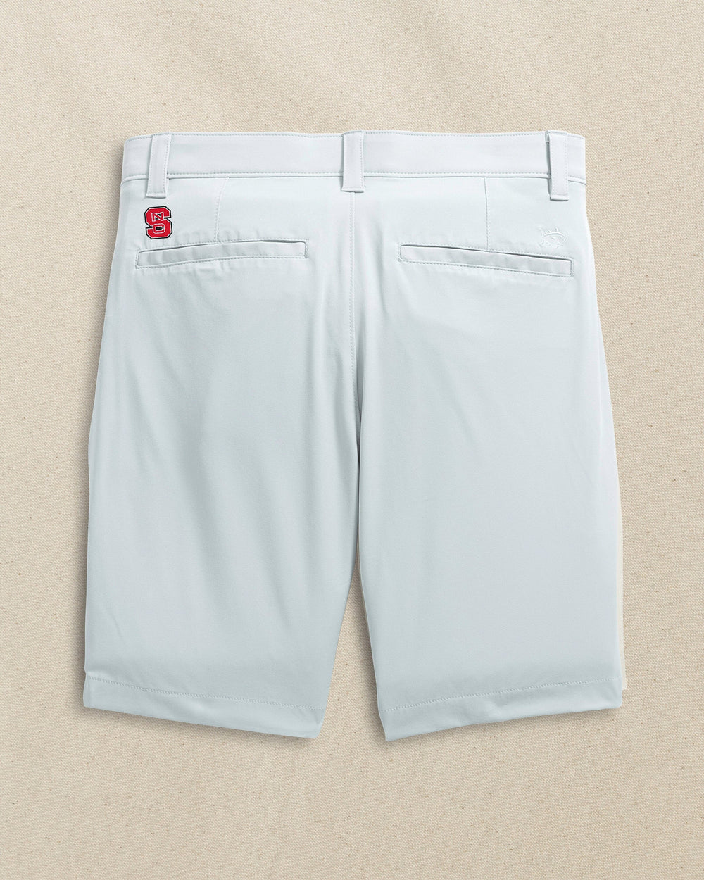 The back view of the Southern Tide NC State Wolfpack brrr°®-die 8" Performance Short by Southern Tide - Seagull Grey