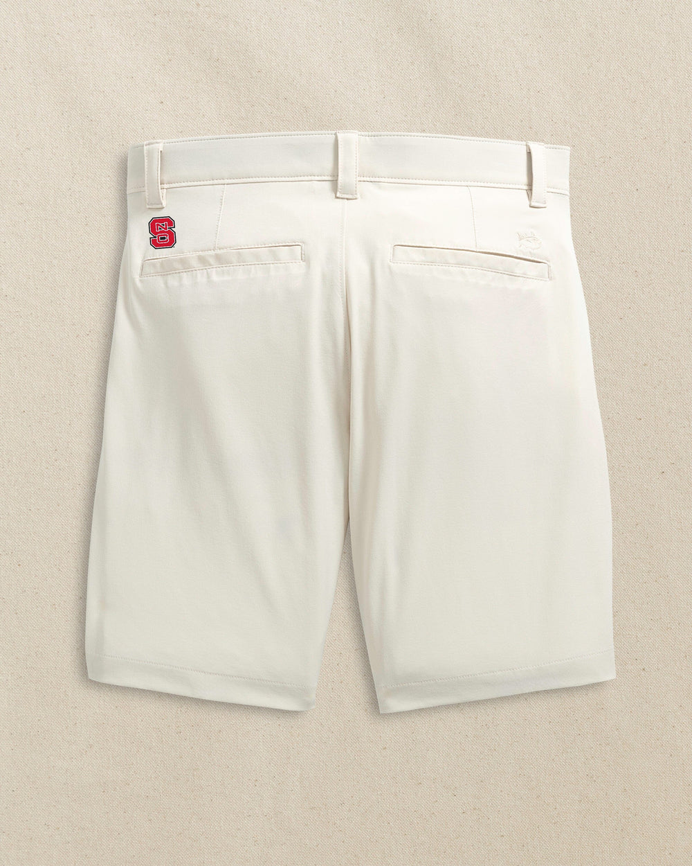 The back view of the Southern Tide NC State Wolfpack brrr°®-die 8" Performance Short by Southern Tide - Stone