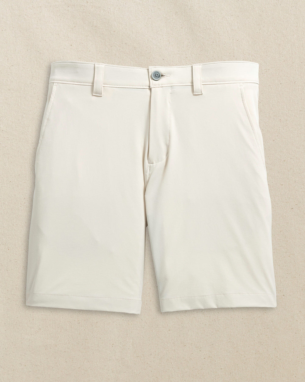 The front view of the Southern Tide NC State Wolfpack brrr°®-die 8" Performance Short by Southern Tide - Stone