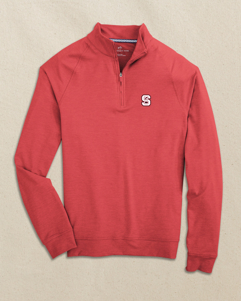 The front view of the Southern Tide NC State Wolfpack Cruiser Quarter Zip by Southern Tide - Heather Varsity Red