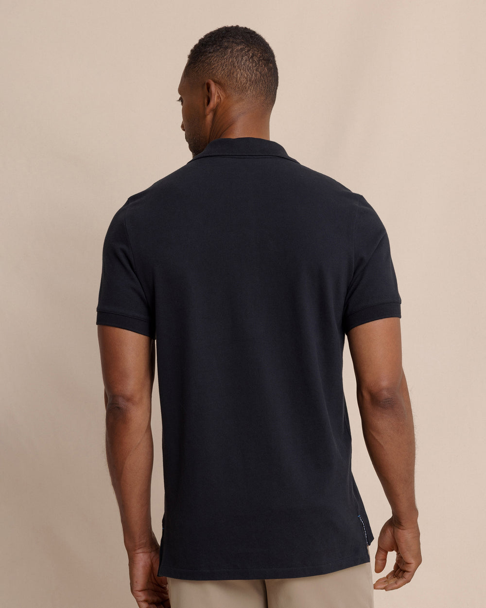 The back view of the Southern Tide Skipjack Polo Shirt by Southern Tide - Midnight Black