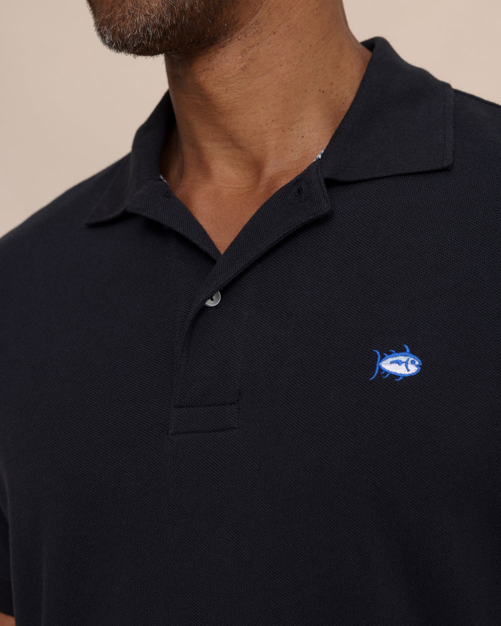 The detail view of the Southern Tide Skipjack Polo Shirt by Southern Tide - Midnight Black