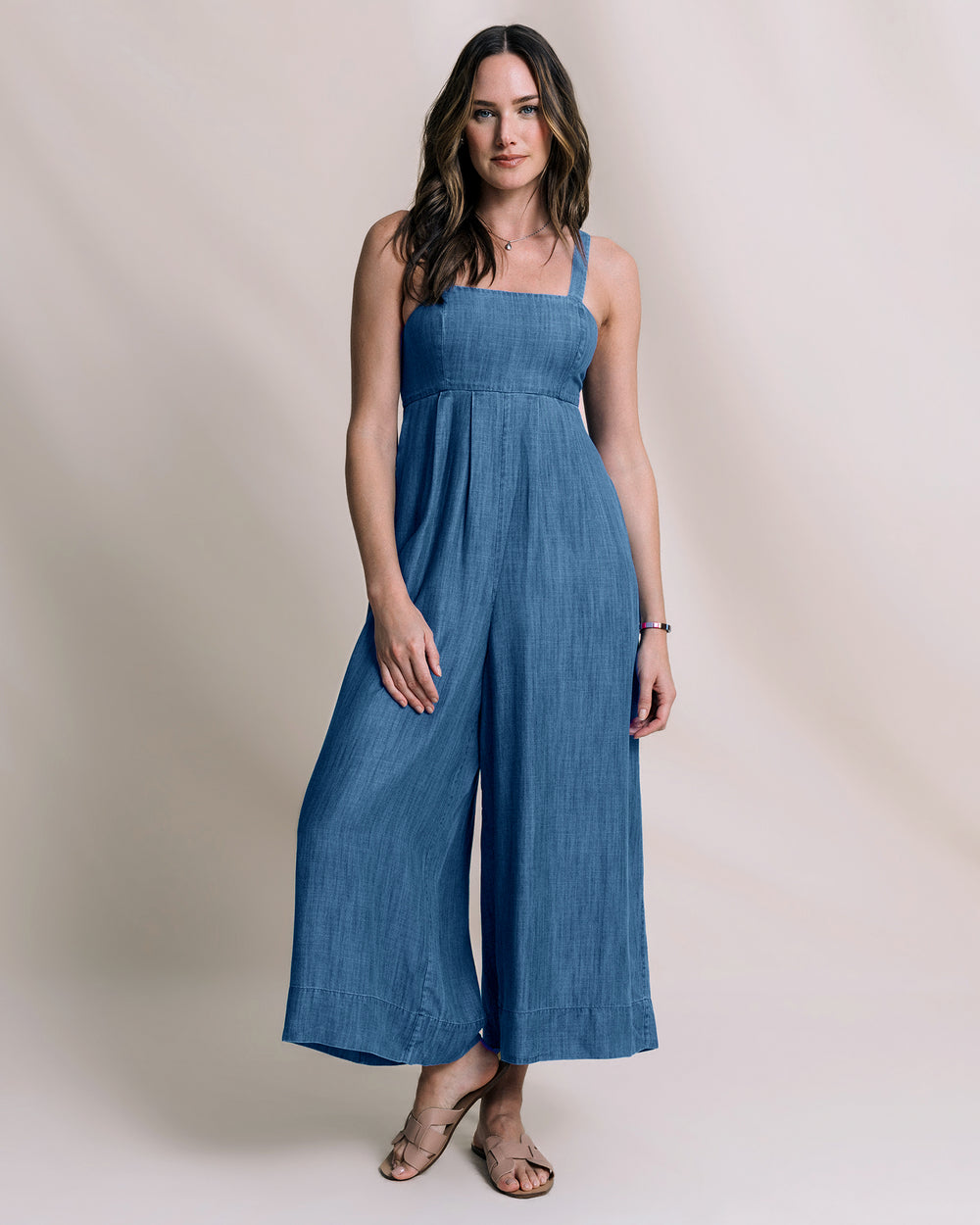 The front view of the Southern Tide Nina Denim Jumpsuit by Southern Tide - Medium Wash Indigo