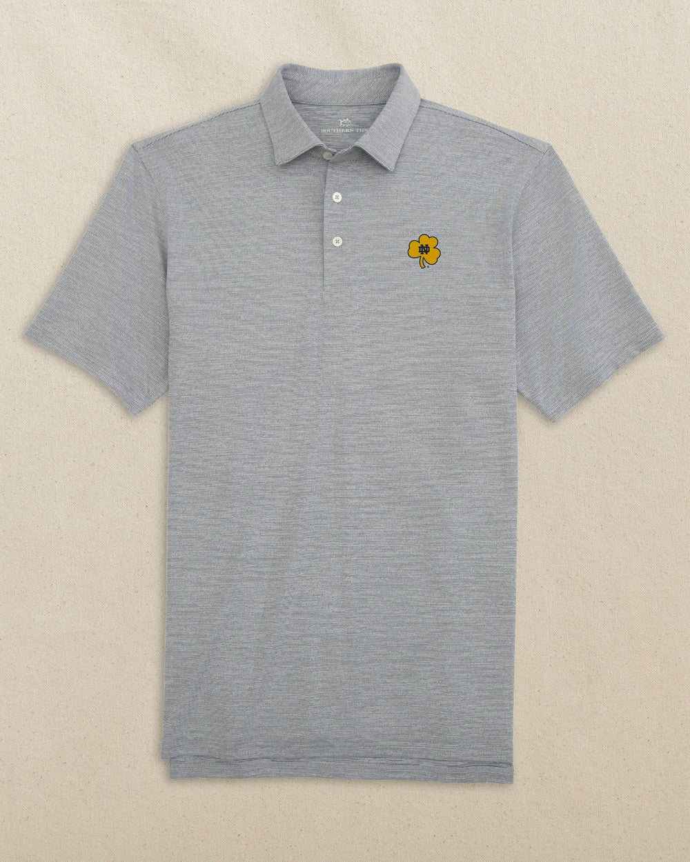 The front view of the Southern Tide Notre Dame Shamrock Driver Spacedye Polo by Southern Tide - Navy