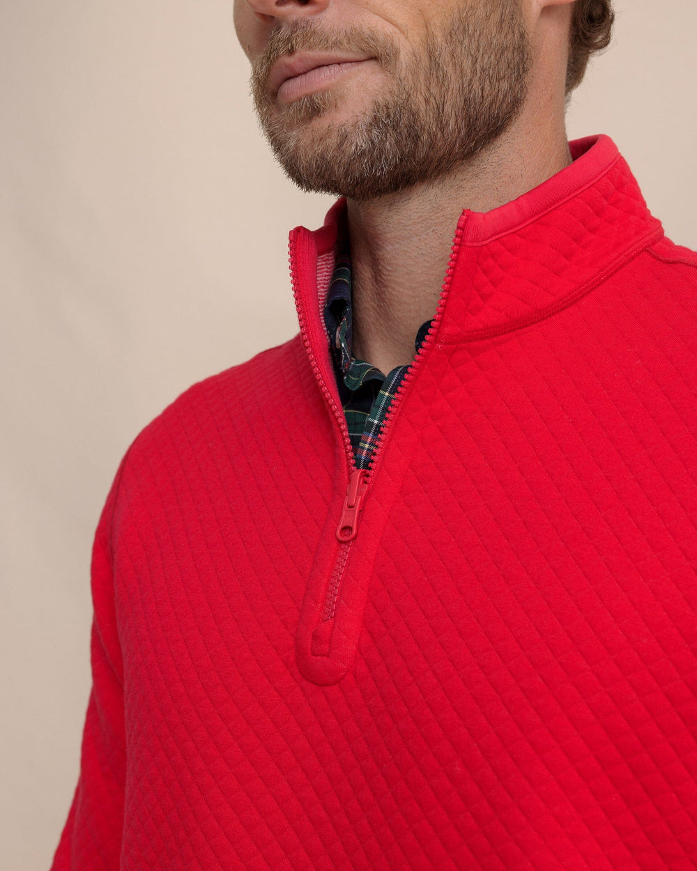 The detail view of the Southern Tide Oak Island Reversible Quarter Zip by Southern Tide - Grenadine Red