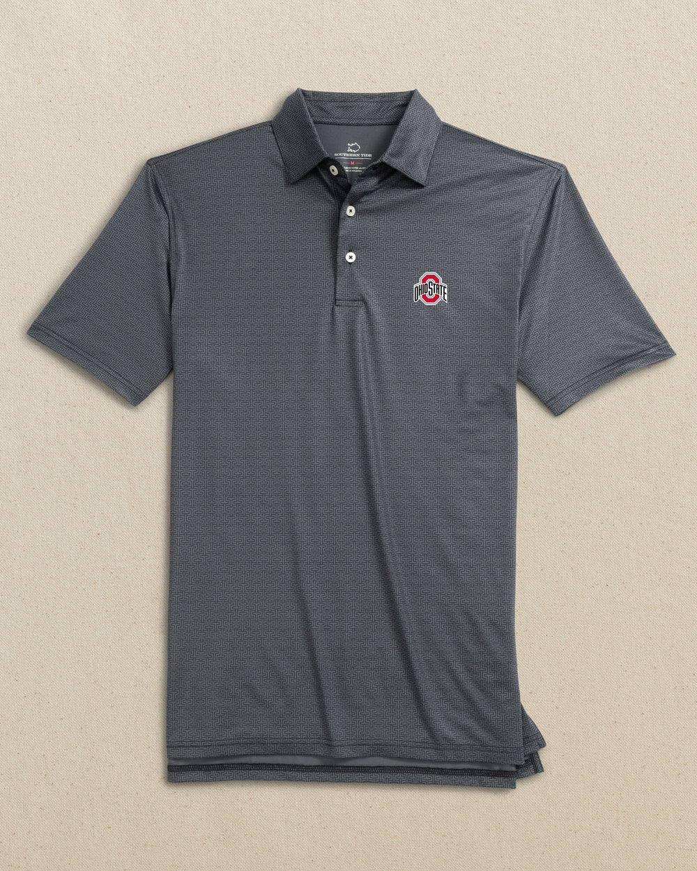The front view of the Southern Tide Ohio State Buckeyes Driver ST Geo Printed Polo by Southern Tide - Caviar Black