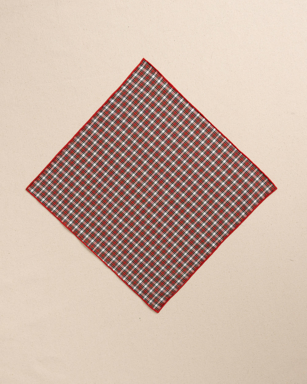 The front view of the High Cotton Peppermint Plaid Cotton Pocket Square at Southern Tide - Red