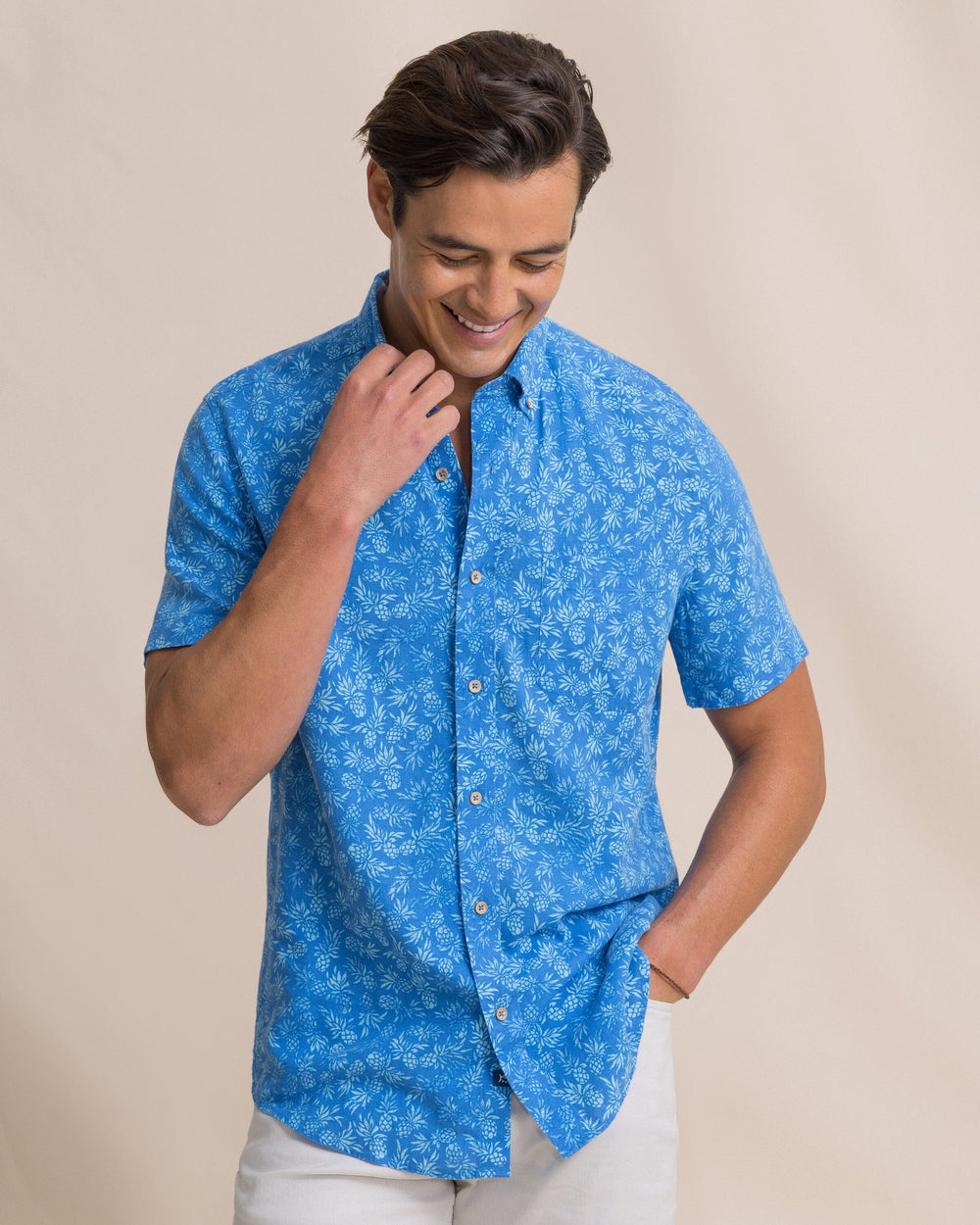 The front view of the Southern Tide Pineapple Parade Linen Rayon Short Sleeve Sport Shirt by Southern Tide - Blue Stream