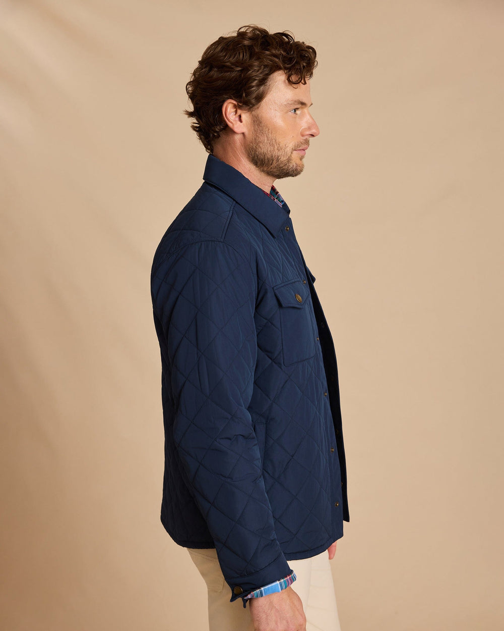 The side view of the Southern Tide Quilted Jacket by Southern Tide - Dress Blue