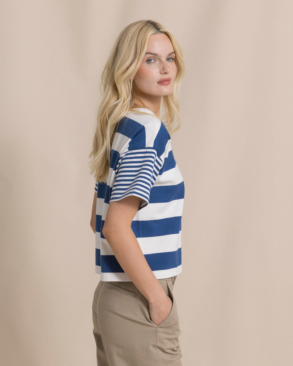 The side view of the Southern Tide Remi Mixed Stripe Boxy Tee by Southern Tide - Nautical Blue