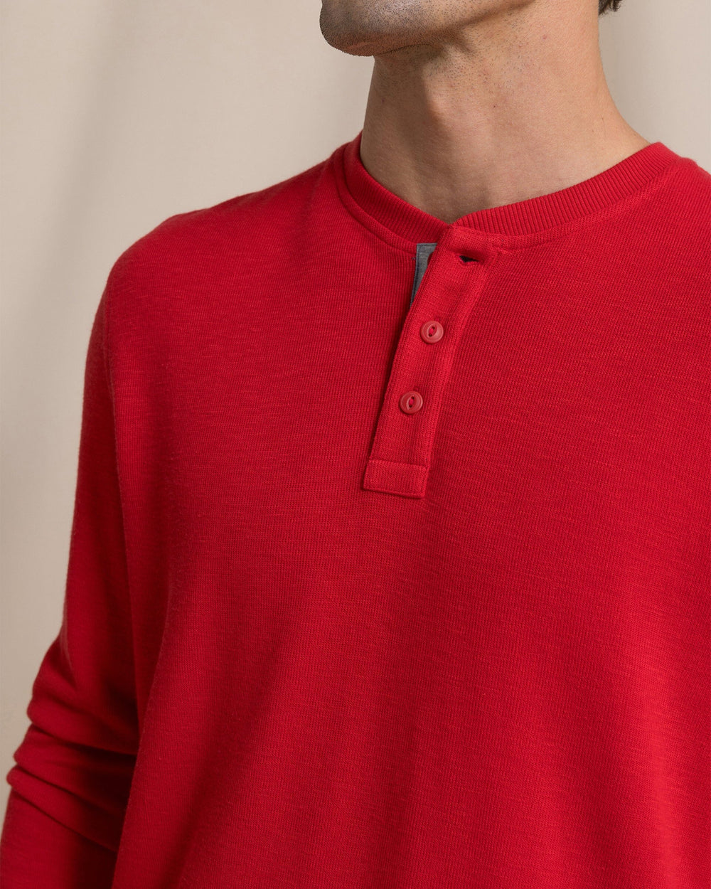The detail view of the Southern Tide Rib Knit Henley by Southern Tide - Salsa Red