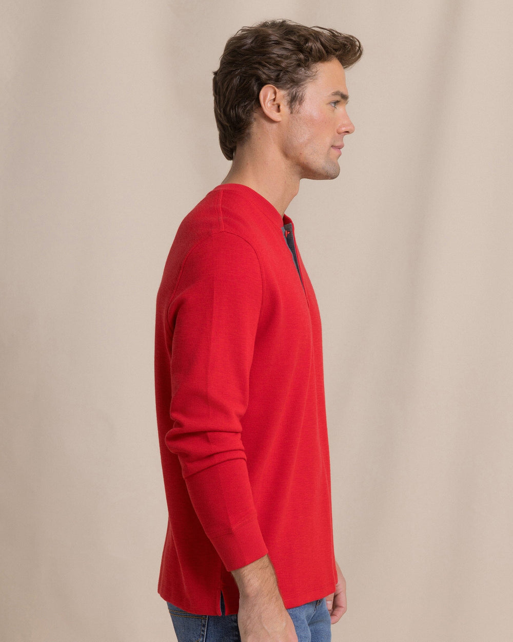 The side view of the Southern Tide Rib Knit Henley by Southern Tide - Salsa Red