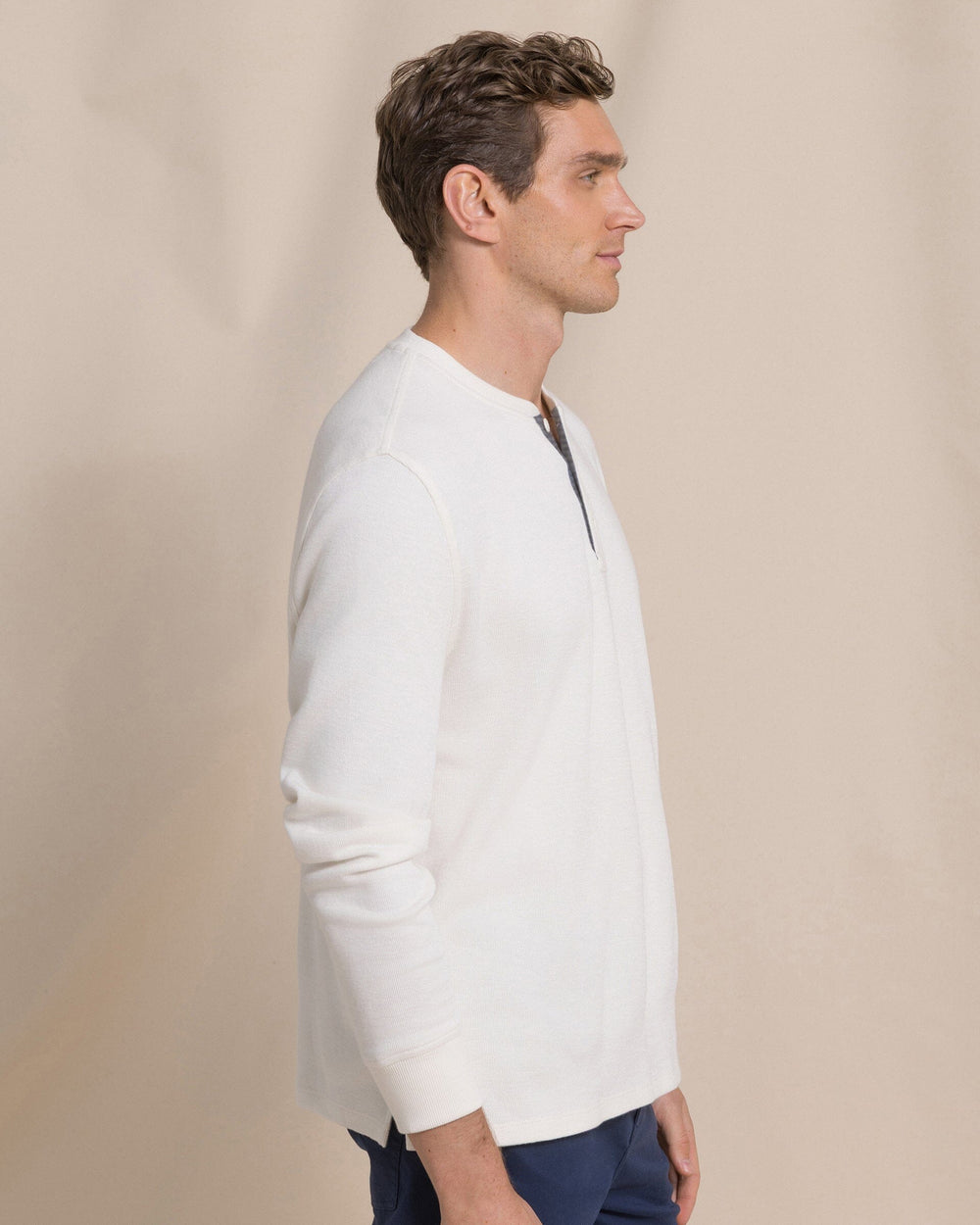 The side view of the Southern Tide Rib Knit Henley by Southern Tide - Sand White