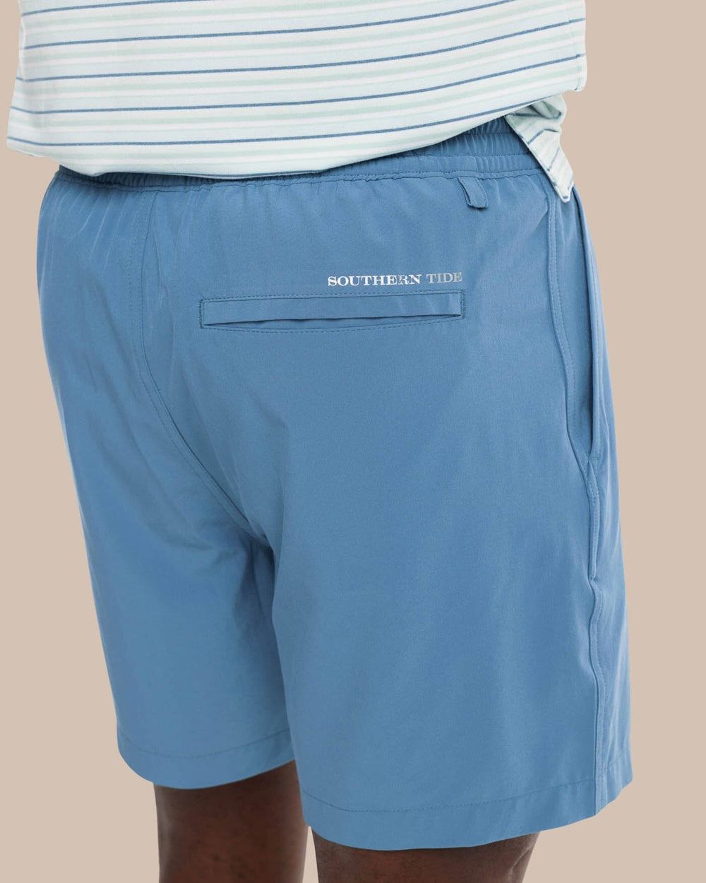 The model pocket view of the Men's Rip Channel 6 Inch Performance Short by Southern Tide - Blue Ridge