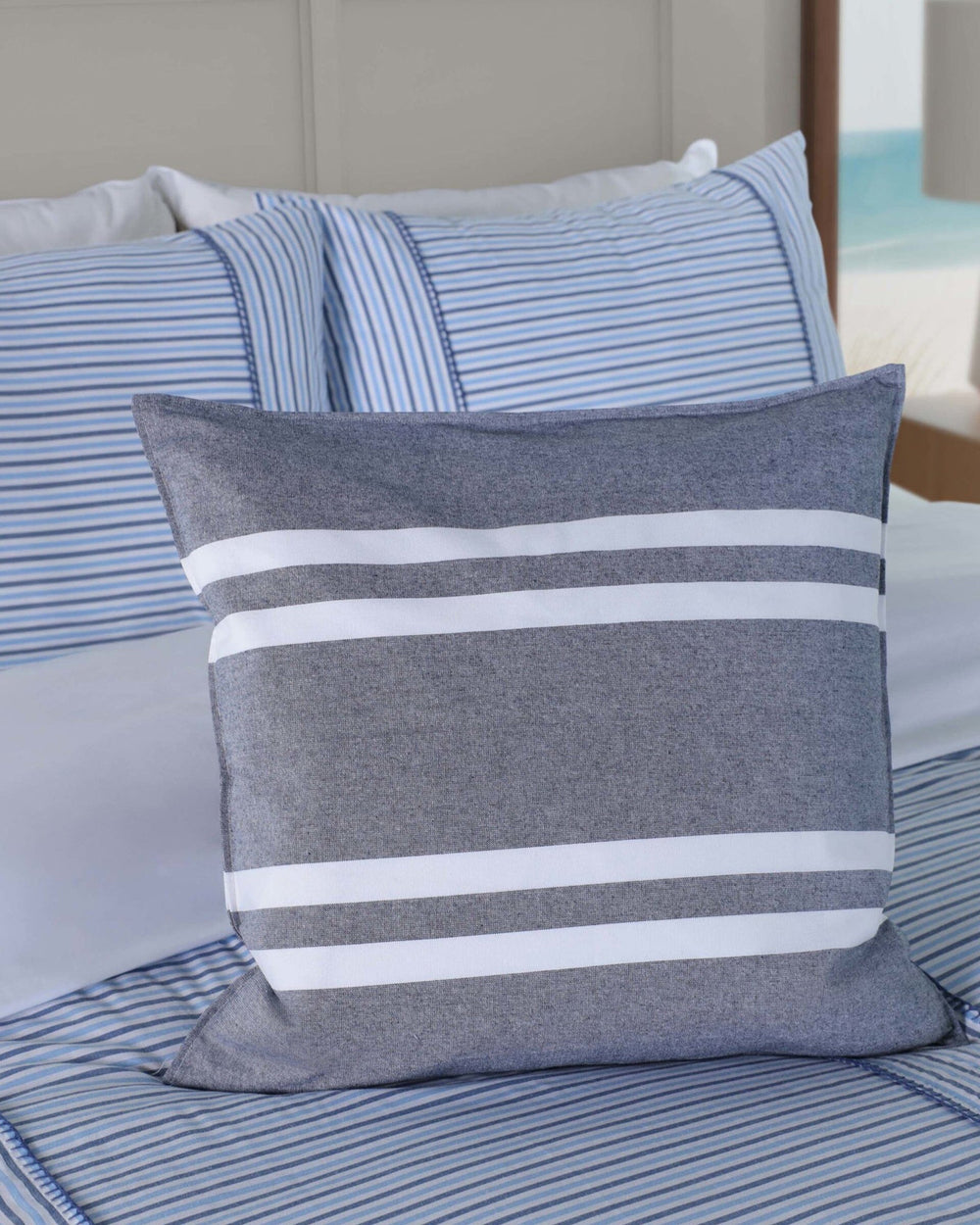 The detail view of the Southern Tide Sailor Stripe Square Decorative Pillow by Southern Tide - Navy