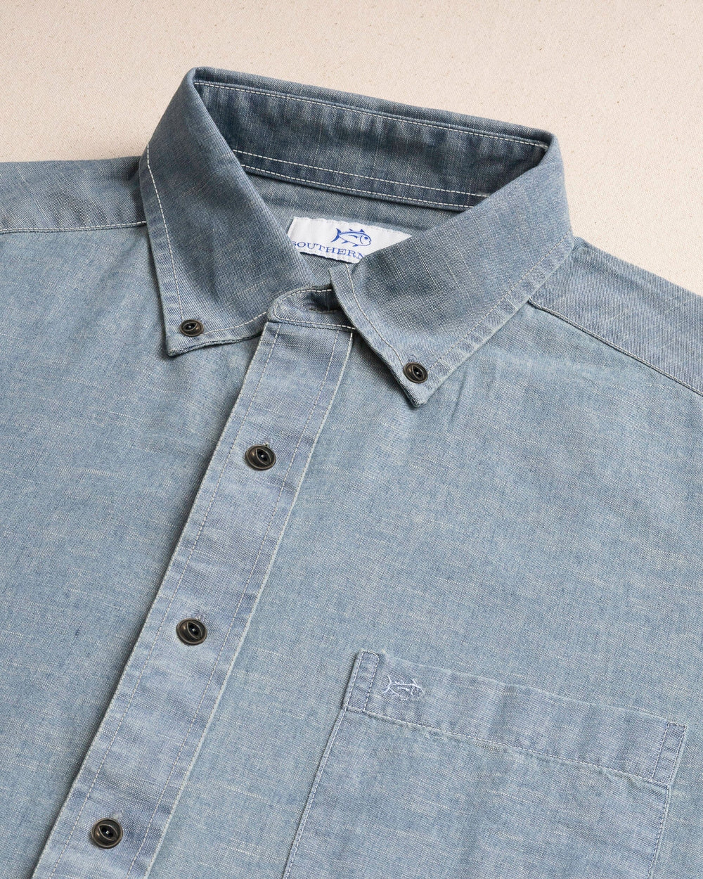 The detail view of the Southern Tide Sandy Beach Chambray Sport Shirt by Southern Tide - Blue Chambray