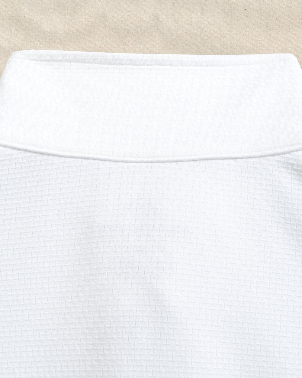 The detail view of the Southern Tide Schooner Long Sleeve Quarter Zip by Southern Tide - Classic White