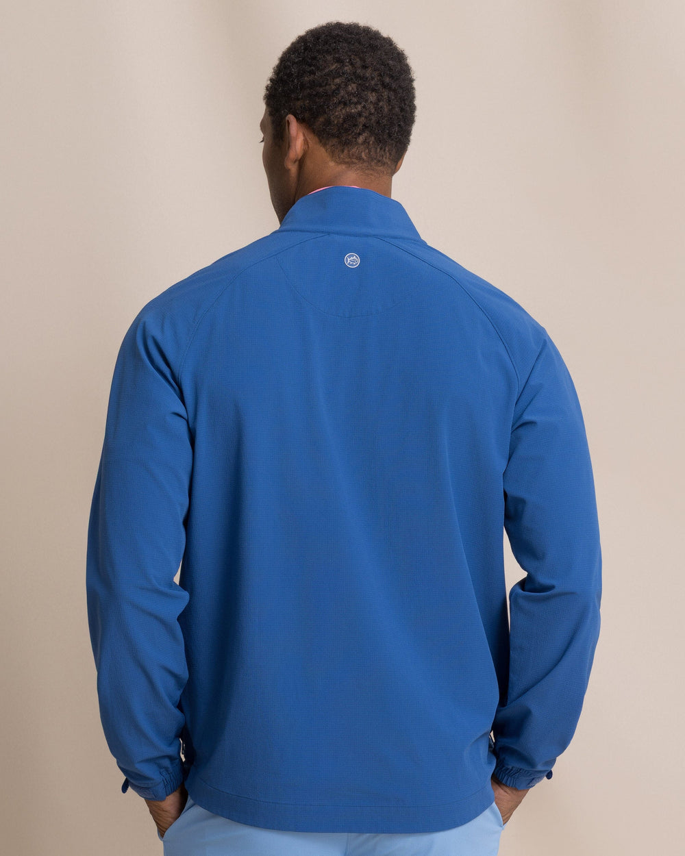 The back view of the Southern Tide Seabreeze Performance Pullover by Southern Tide - Nautical Blue