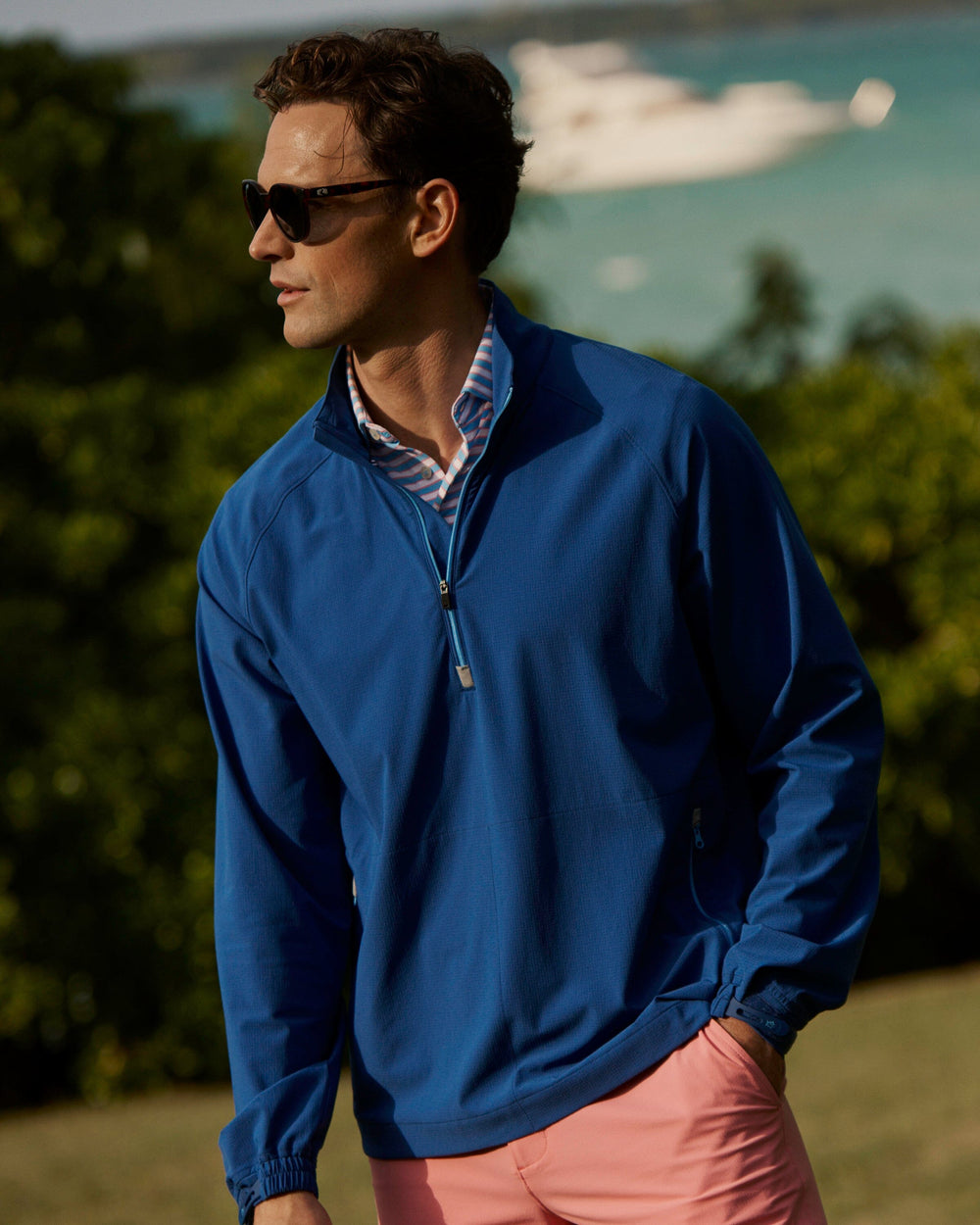 The lifestyle view of the Southern Tide Seabreeze Performance Pullover by Southern Tide - Nautical Blue