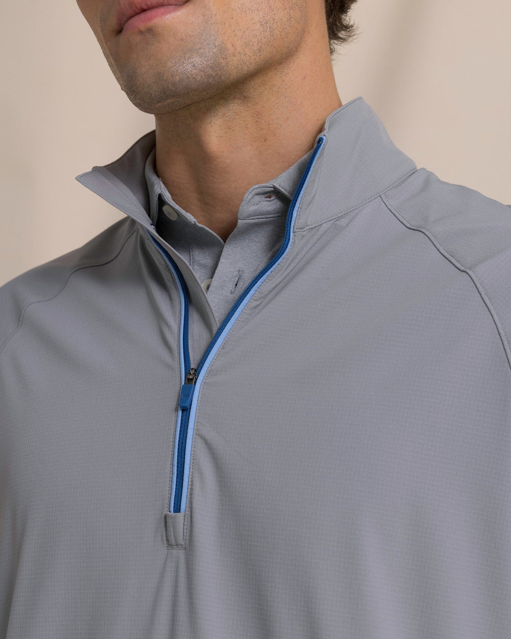 The detail view of the Southern Tide Seabreeze Performance Pullover by Southern Tide - Steel Grey