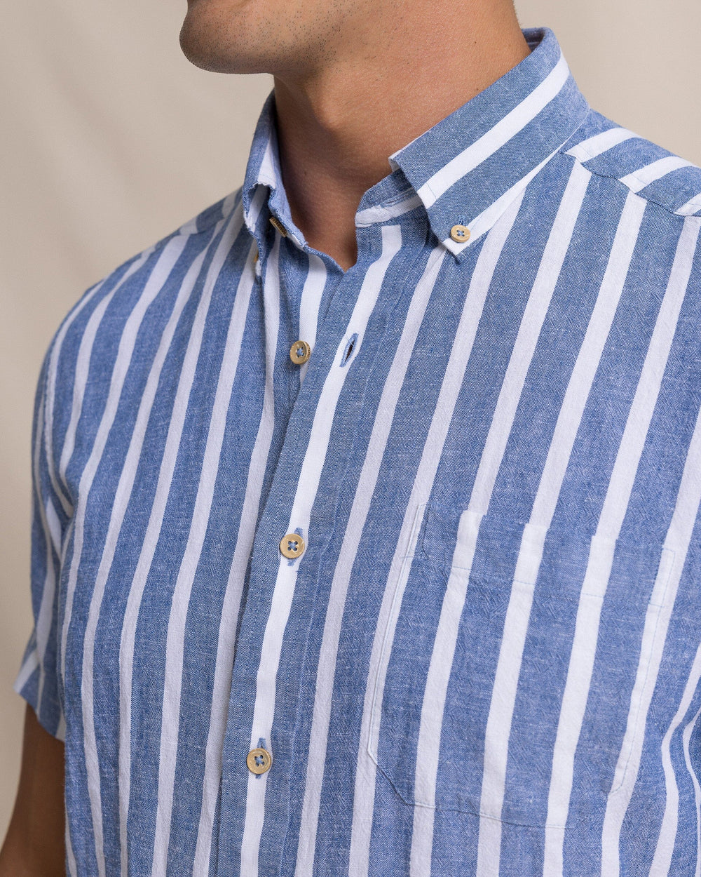 The detail view of the Southern Tide Seamark Stripe Linen Rayon Short Sleeve Sport Shirt by Southern Tide - Nautical Blue