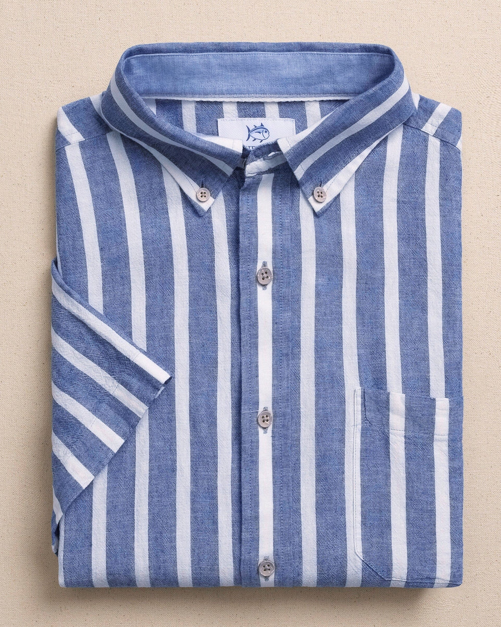 The front view of the Southern Tide Seamark Stripe Linen Rayon Short Sleeve Sport Shirt by Southern Tide - Nautical Blue