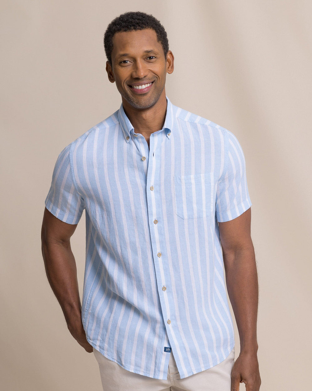 The front view of the Southern Tide Seamark Stripe Linen Rayon Short Sleeve Sport Shirt by Southern Tide - Tide Blue
