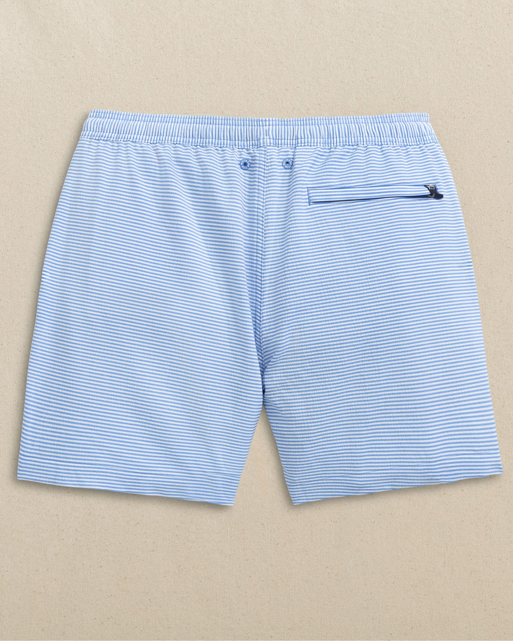 The back view of the Southern Tide Seersucker Stripe Maritime Swim Trunk by Southern Tide - Blue Stream