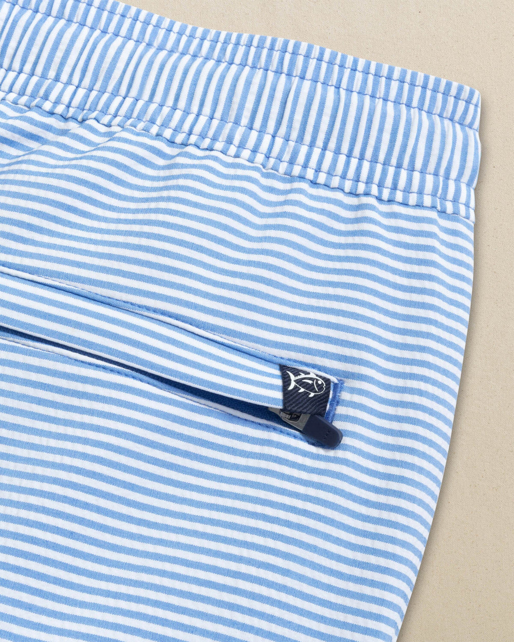 The detail view of the Southern Tide Seersucker Stripe Maritime Swim Trunk by Southern Tide - Blue Stream