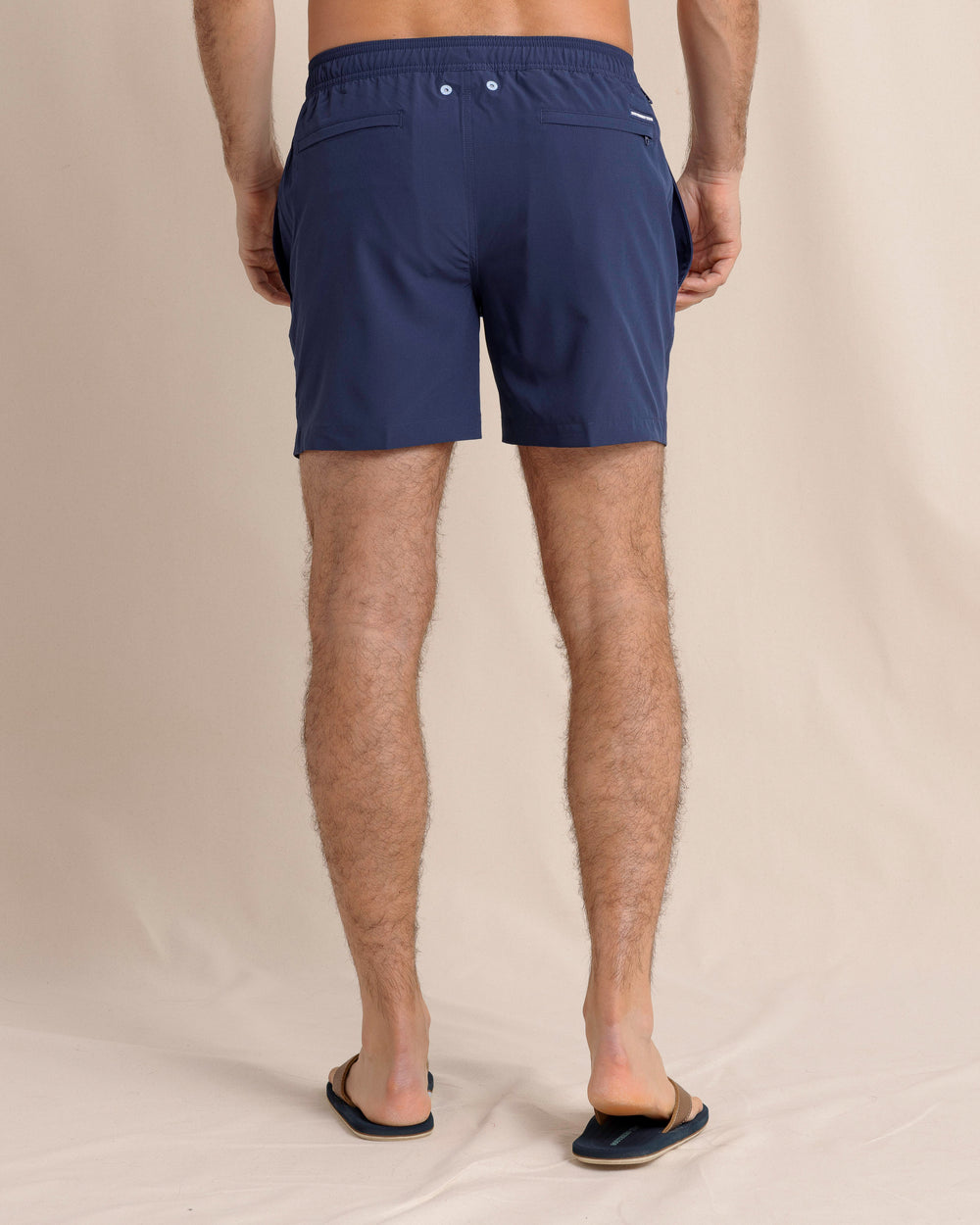 The back view of the Southern Tide Solid Swim Trunk 3 by Southern Tide - True Navy