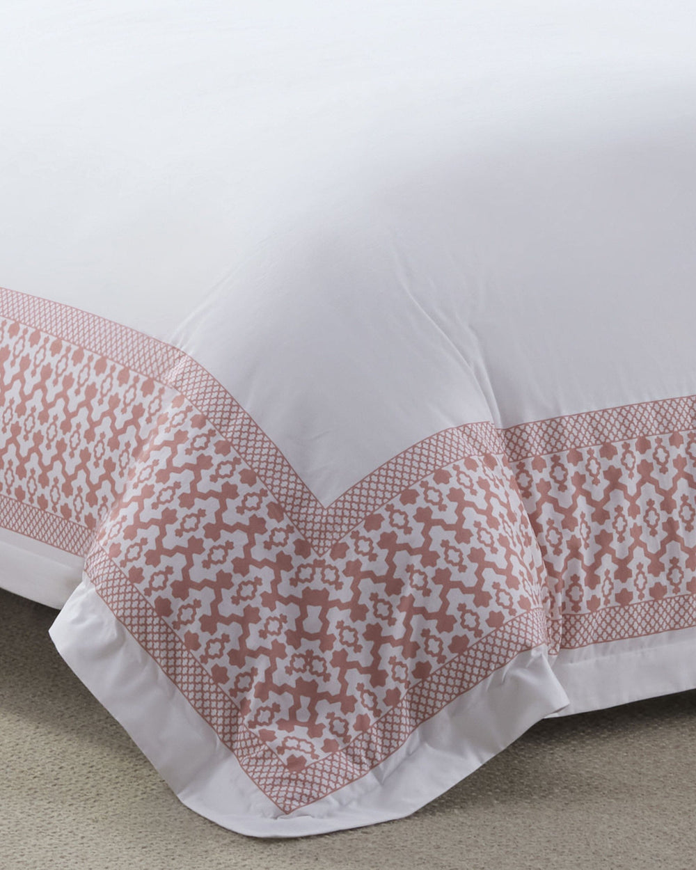 The front view of the Southern Tide Southern Tide Augustine Comforter Set by Southern Tide - White/Pink