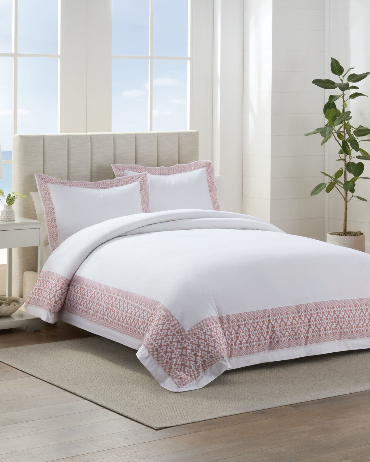 The front view of the Southern Tide Southern Tide Augustine Comforter Set by Southern Tide - White/Pink