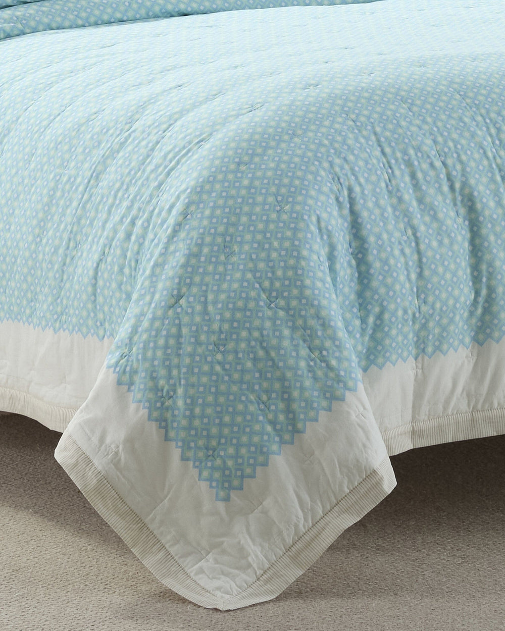 The front view of the Southern Tide Southern Tide Bellweather Quilt by Southern Tide - Multi