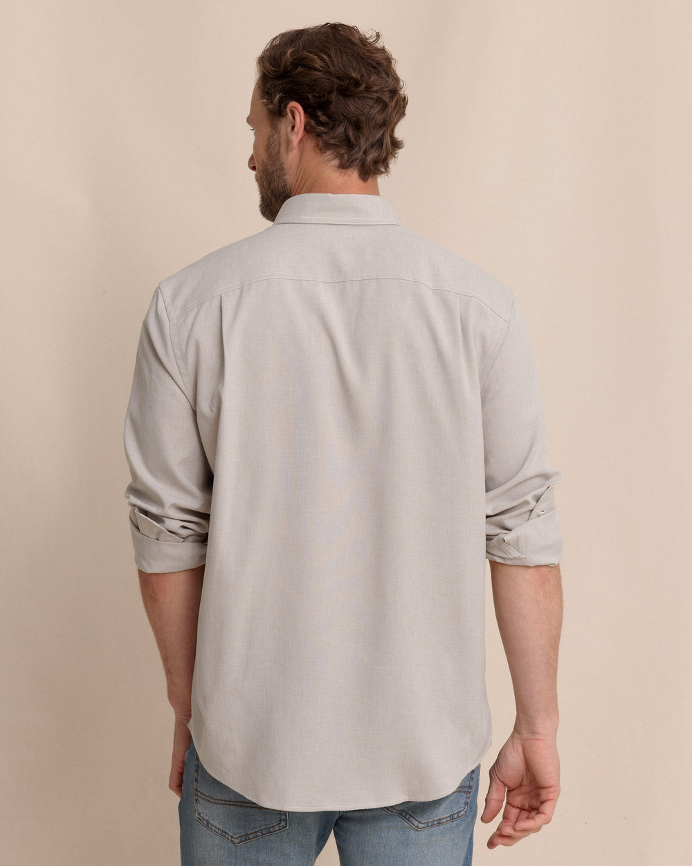 The back view of the Southern Tide Dock Shirt by Southern Tide - Sandstone Khaki