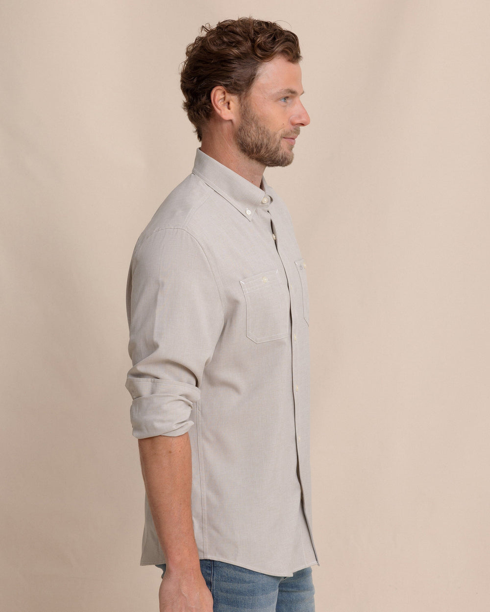The side view of the Southern Tide Dock Shirt by Southern Tide - Sandstone Khaki