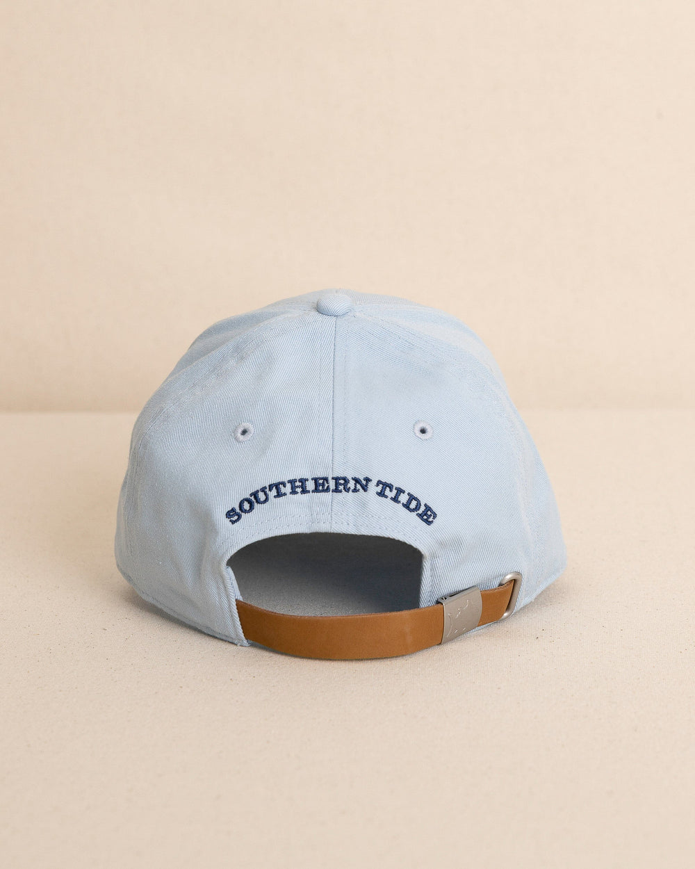 The back view of the Southern Tide ST Flag Leather Strap Hat by Southern Tide - Blue