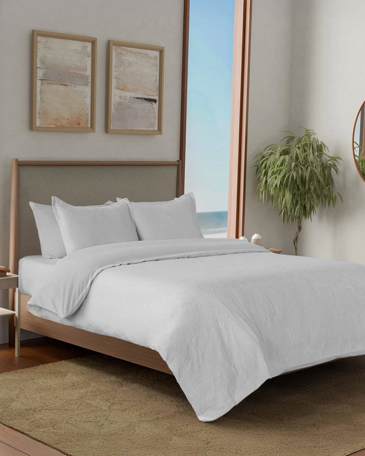 The side view of the Southern Tide St. Simons Comforter Set by Southern Tide - White