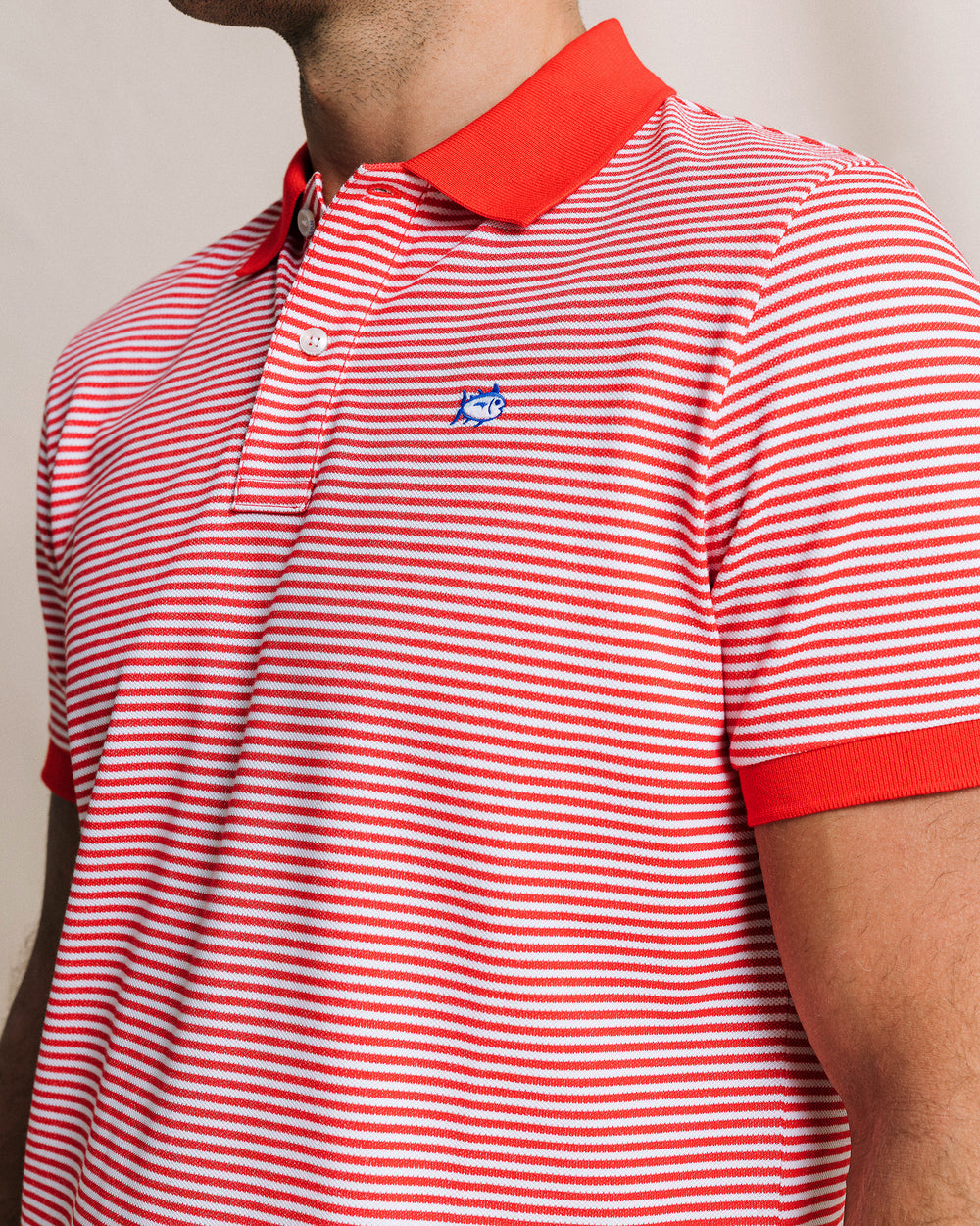 The detail view of the Southern Tide Striped Skipjack Polo by Southern Tide - Channel Marker Red