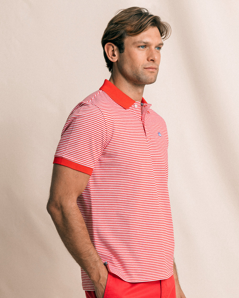 The side view of the Southern Tide Striped Skipjack Polo by Southern Tide - Channel Marker Red