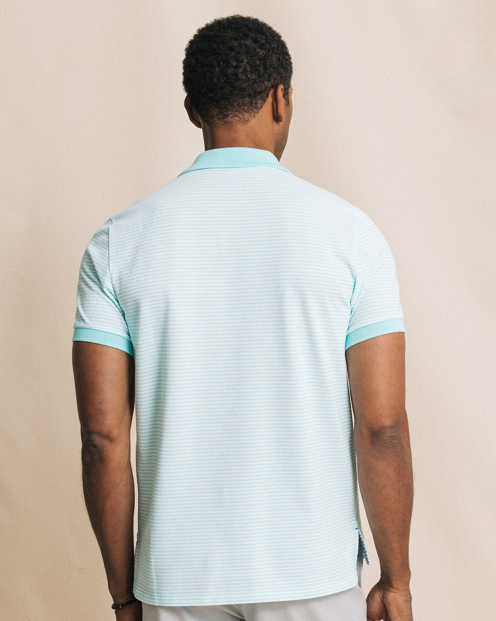 The back view of the Southern Tide Striped Skipjack Polo by Southern Tide - Shore Blue