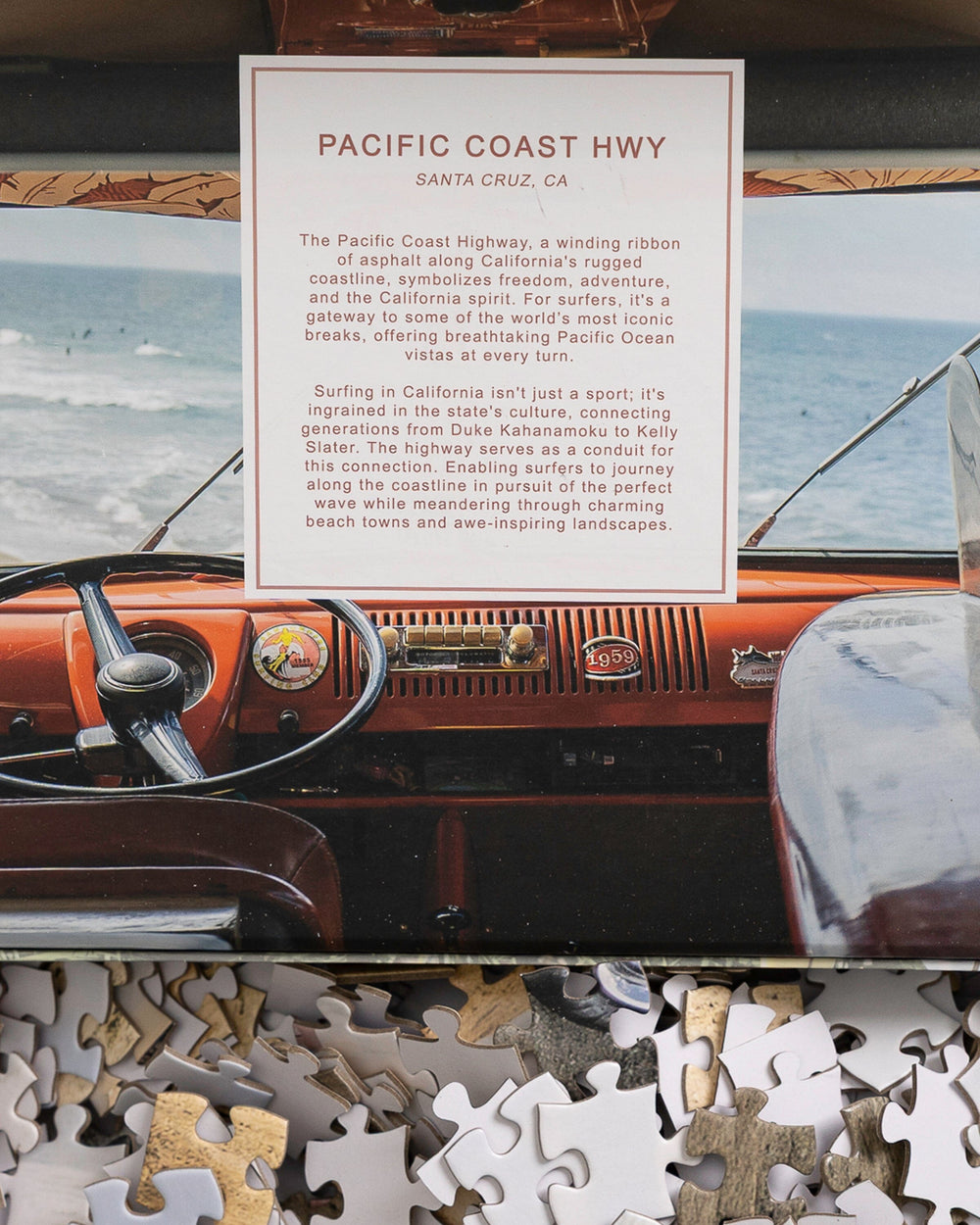 The detail view of the Johnny Vacay Surf Bus 500 Piece Puzzle at Southern Tide - White