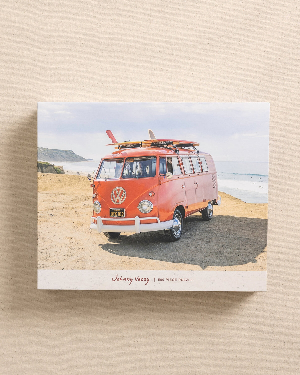 The front view of the Johnny Vacay Surf Bus 500 Piece Puzzle at Southern Tide - White