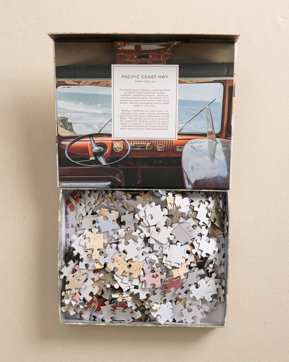 The open view of the Johnny Vacay Surf Bus 500 Piece Puzzle at Southern Tide - White
